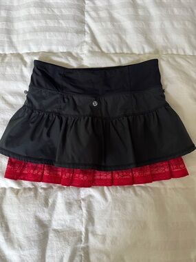 Vintage lululemon athletica RUN skirt. Black mini skirt with red lace hem
